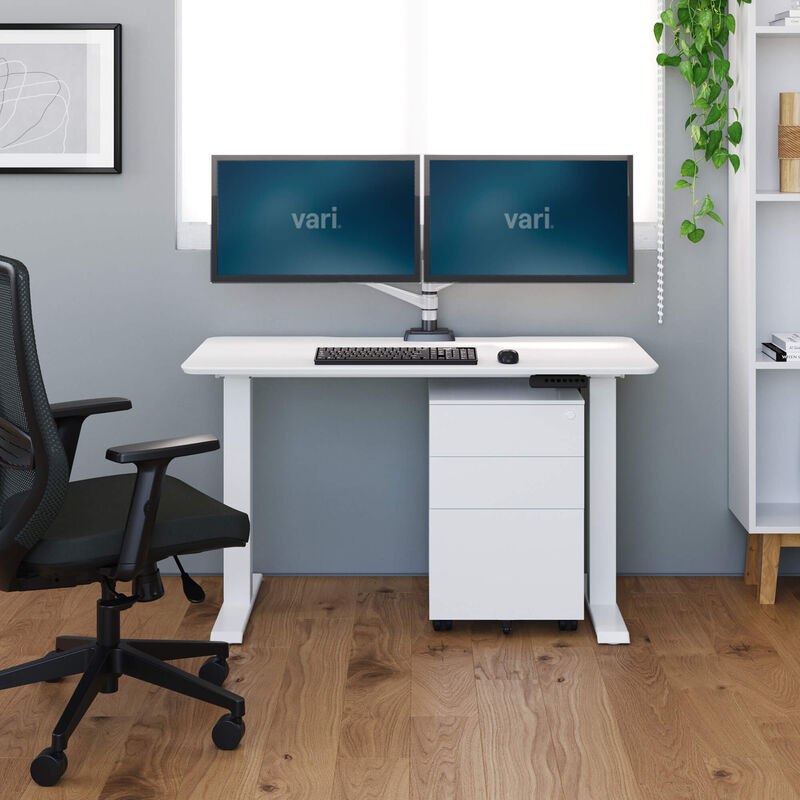 vari essential electric standing desk in office setting image number null