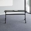 flip top training table 5 ft in black in office setting