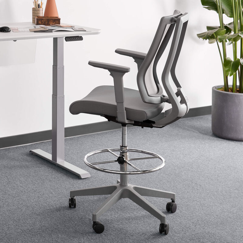 drafting chair in grey in office setting image number null
