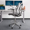 drafting chair in grey in office setting